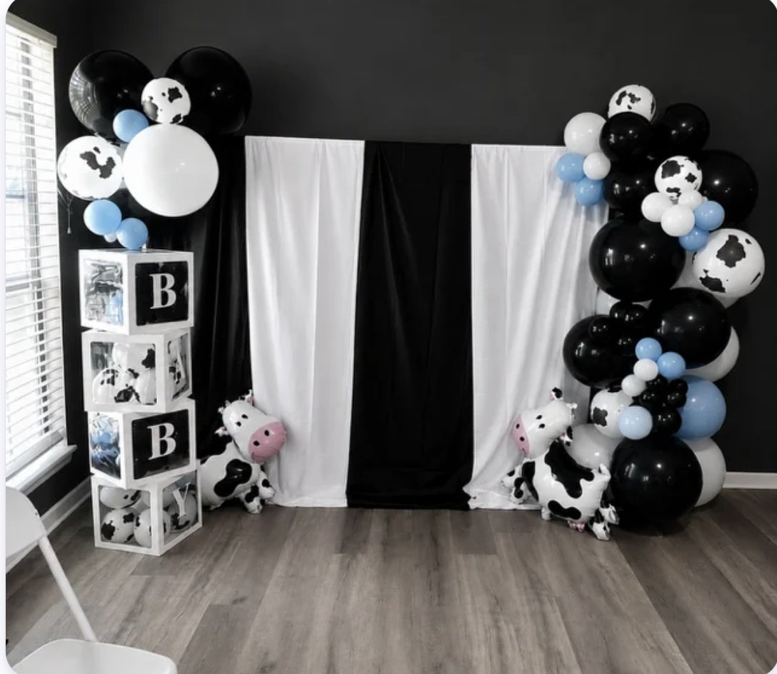 Cow-print event backdrop